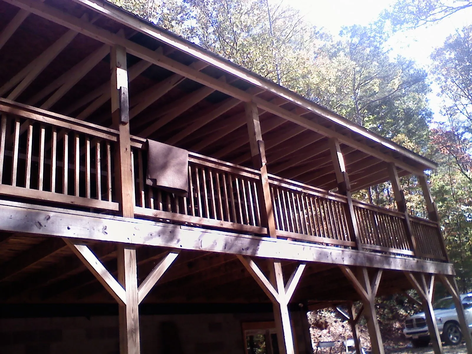 Timber framing under a new elevated porch and deck — Roof Leak Repair in Gattman by Roofing Brothers